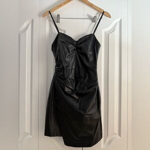 Black mini leather dress very cute- hugs the body.